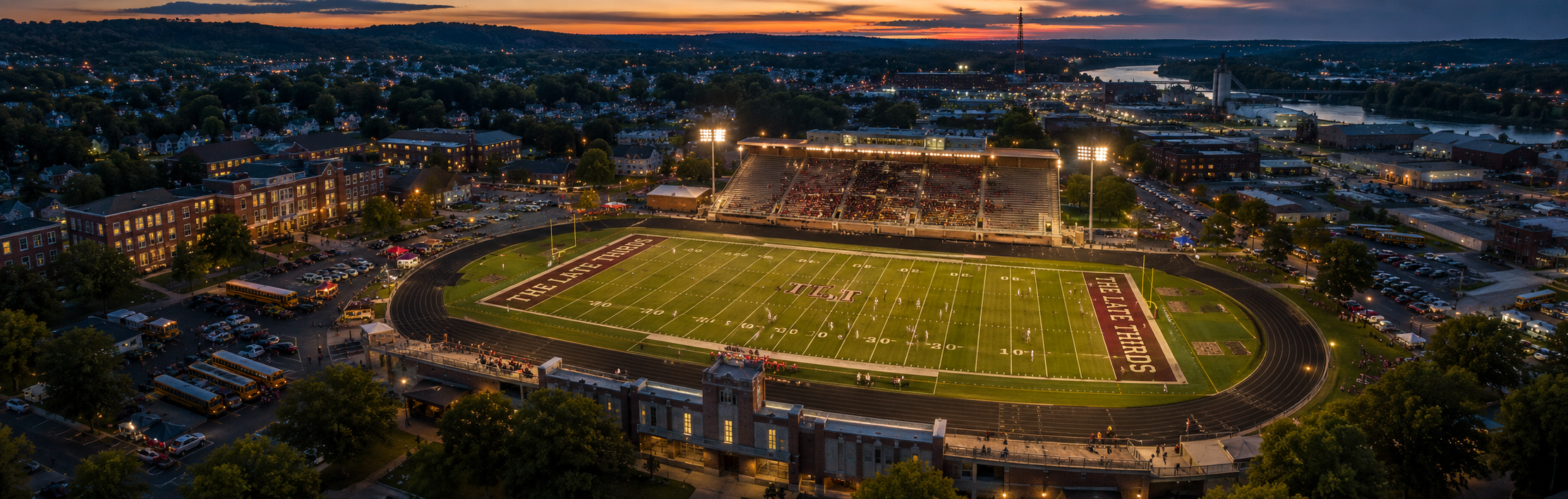 Aerial view of The Late Thirds football field at dusk